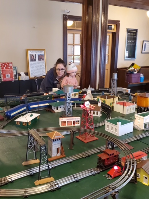 family at Lionel Train exhibit